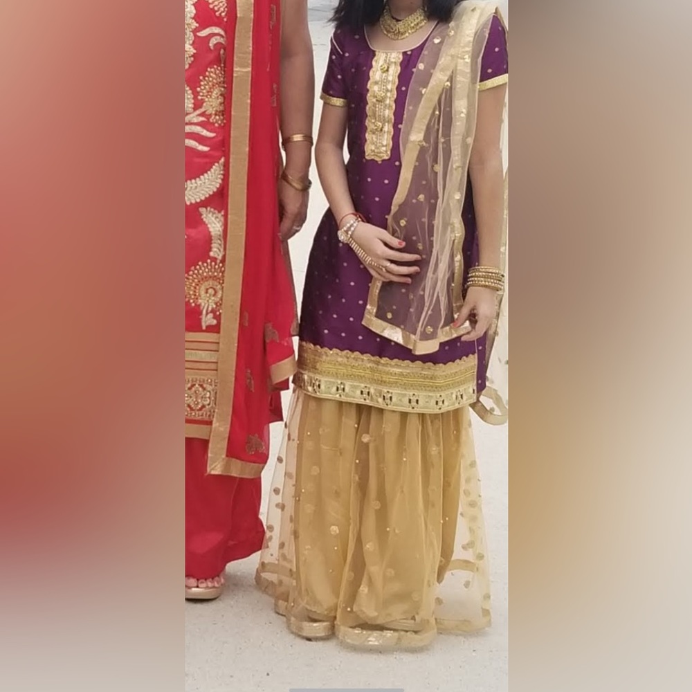 Sharara suit purple top and golden net sharara with dupata